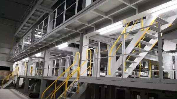 紡熔生產(chǎn)線上卷繞機的輔助設(shè)備